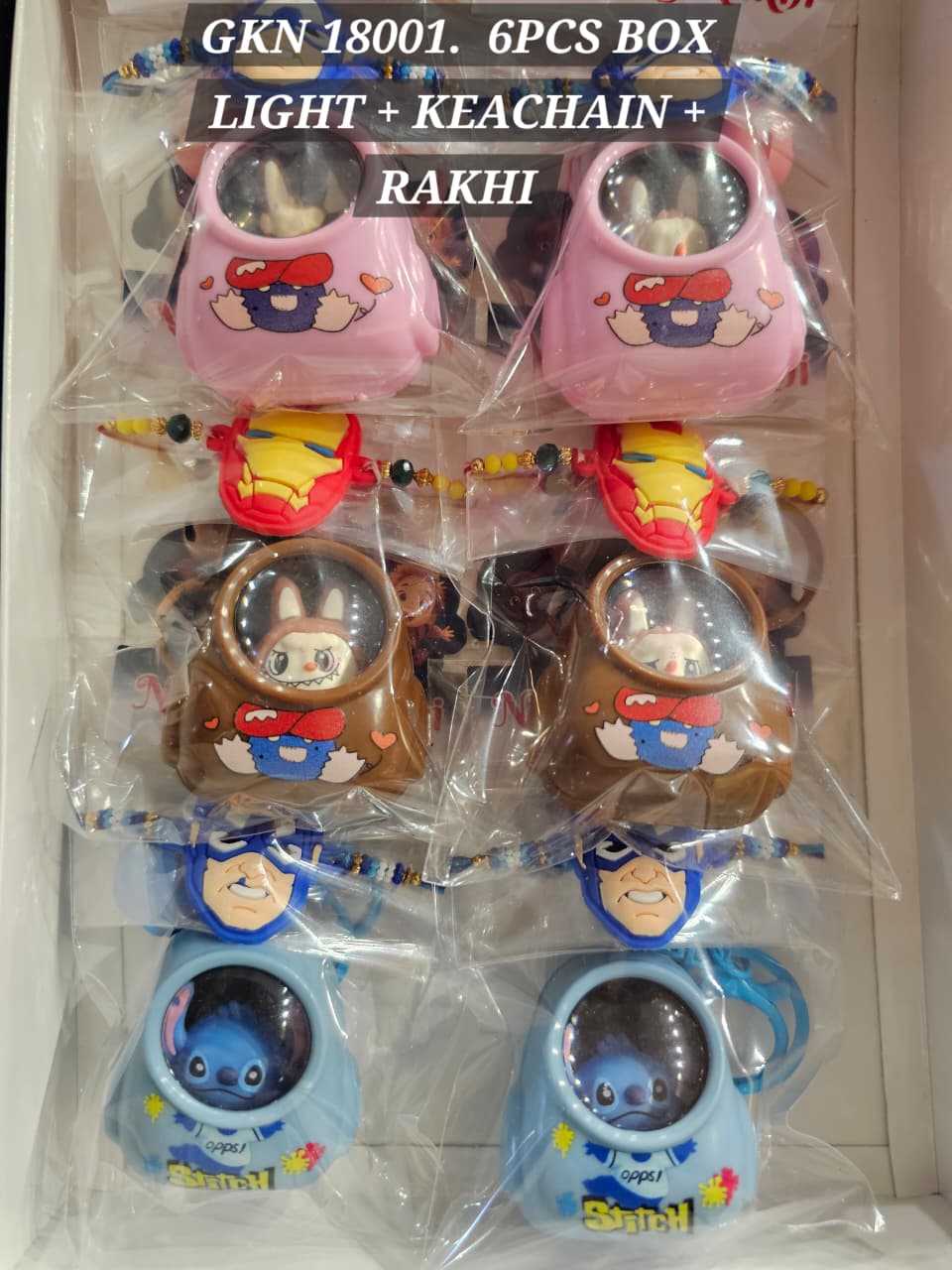 GKN18001 LIGHT + KEYCHAIN RAKHI 90/ Per pc ( 540 Rs Box 6 pc)