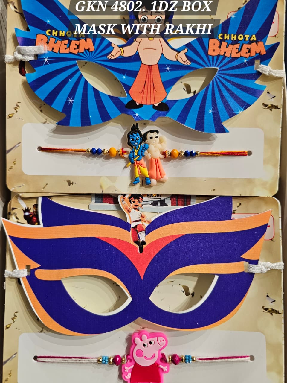 GKN4802 MASK WITH RAKHI 27 Rs / Per pc (324 Rs Dozen)